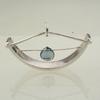 Sterling silver pendant with blue topaz